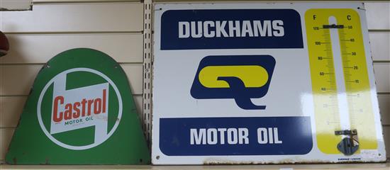 A Castrol Motor Oil and a Duckhams enamel sign